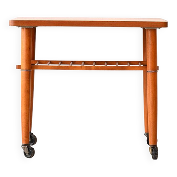 1960s teak coffee table on casters
