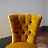 Toad in yellow velvet armchair