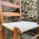 Set de 4 chaises dossier échelonné et assise tissée en coton blanc