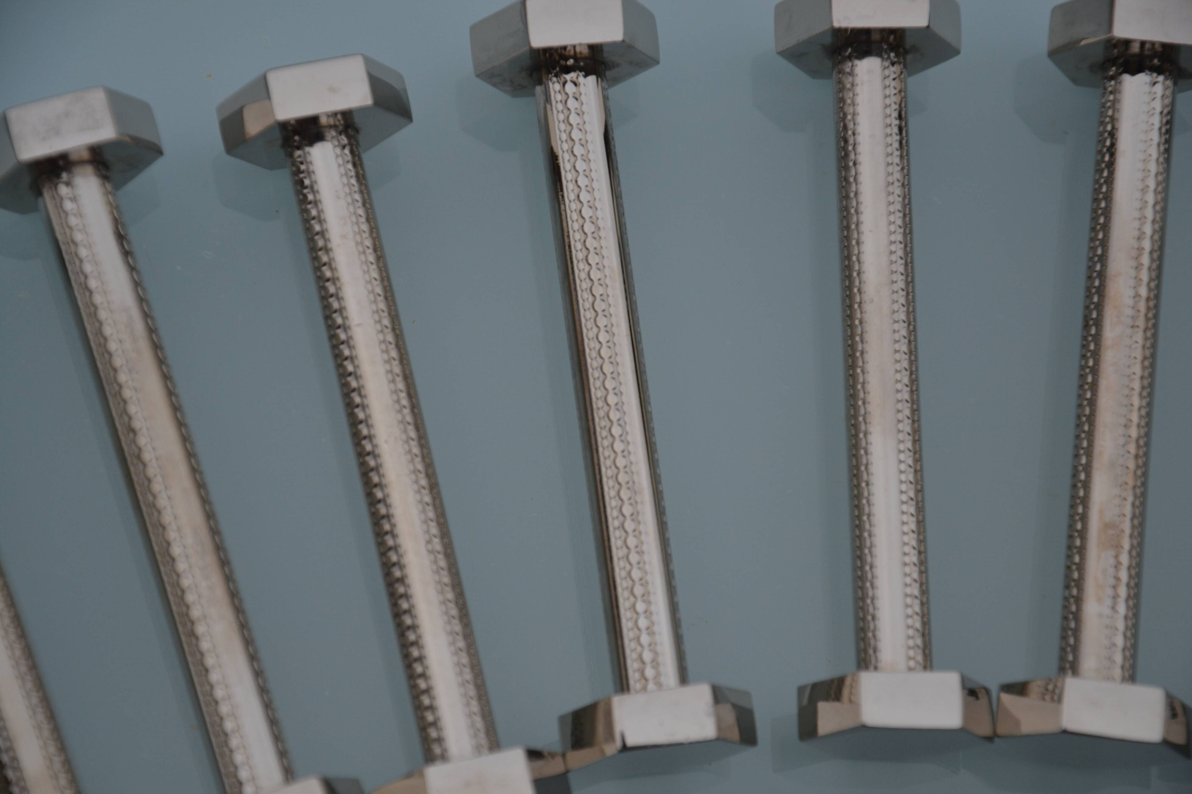 12 bolt-shaped knife rests in their original vintage box