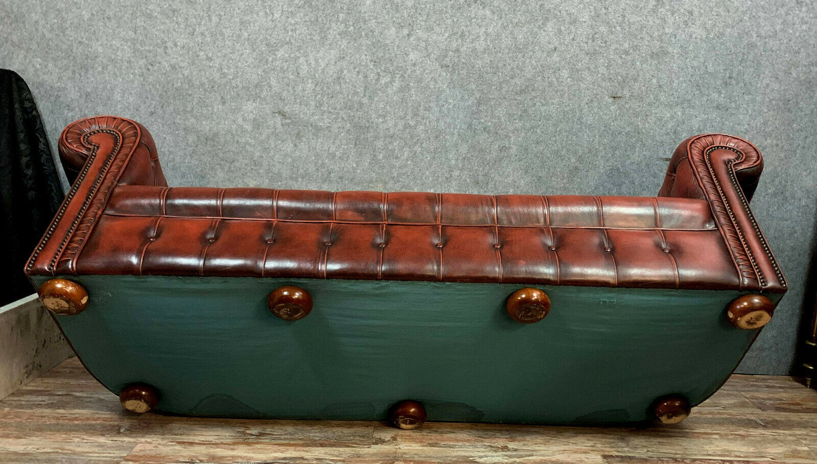 Chesterfield sofa in burgundy upholstered leather circa 1920