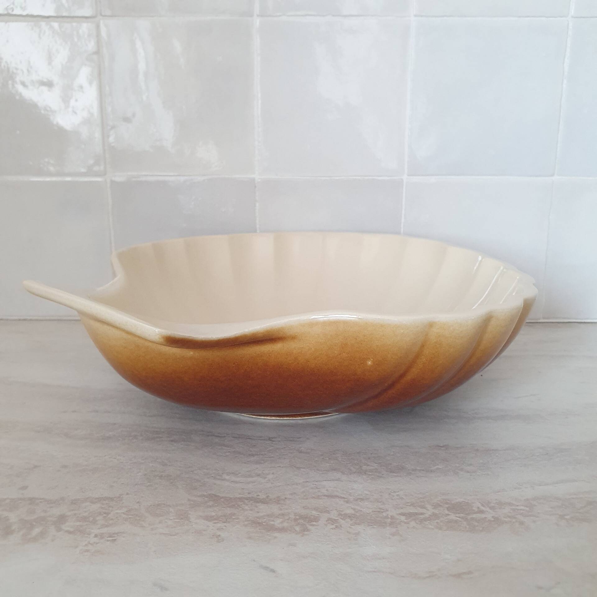Brown and white ceramic shell bowl