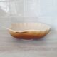 Brown and white ceramic shell bowl
