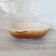 Brown and white ceramic shell bowl