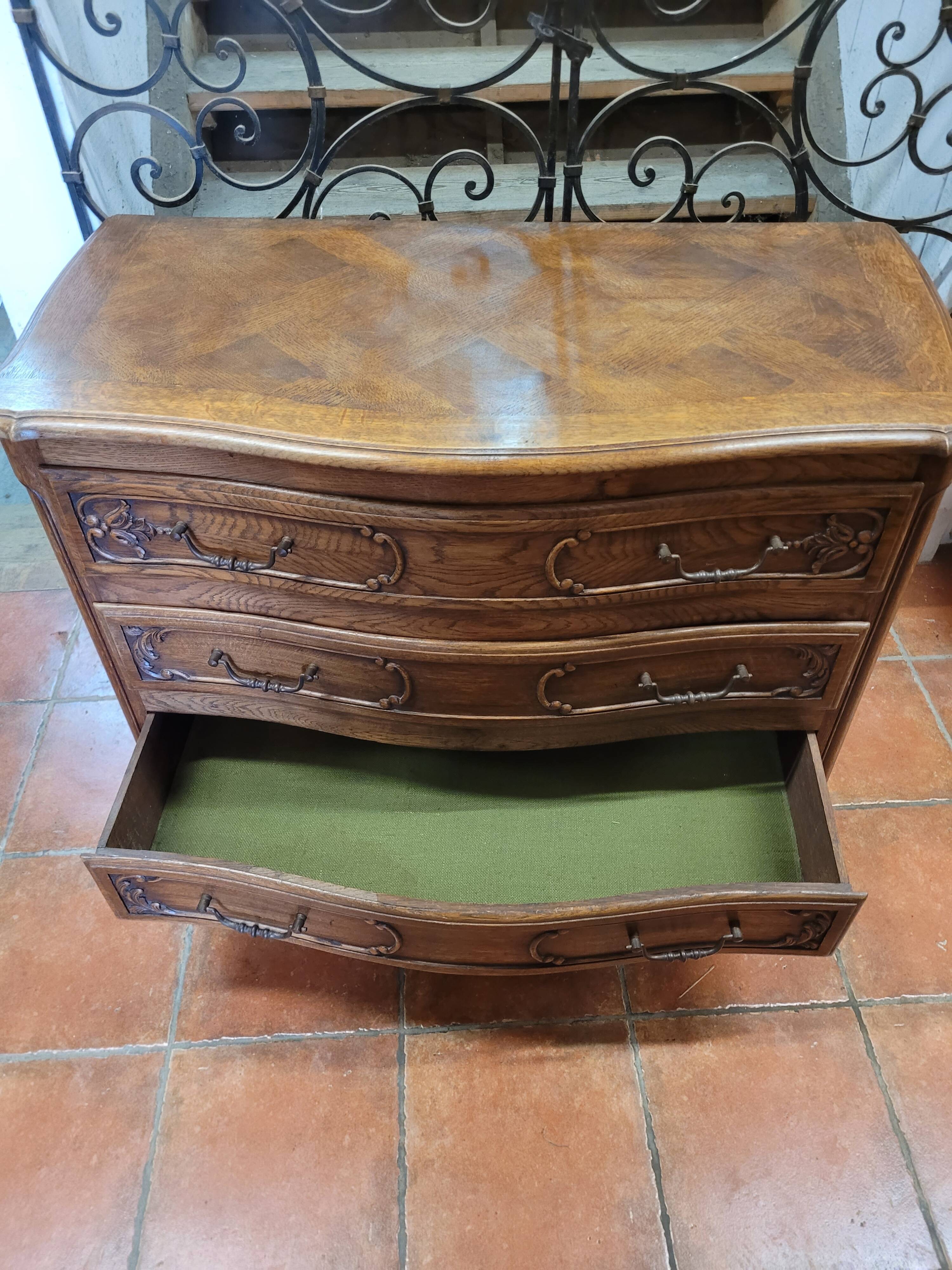 Curved oak chest of drawers in Louis XV style