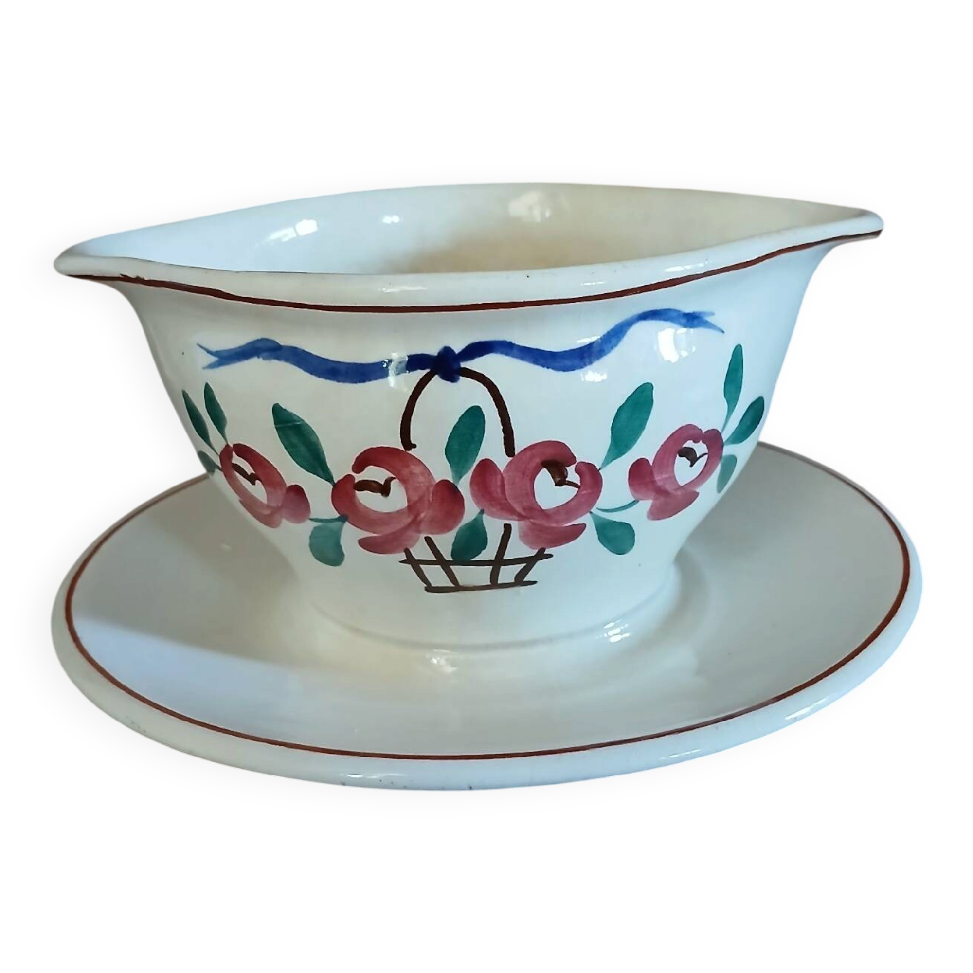 Antique sauce boat in Longchamp ironstone.