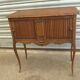 Piece of furniture with two Louis XV-style curtains.
