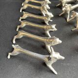 12 animal knife holders in tin