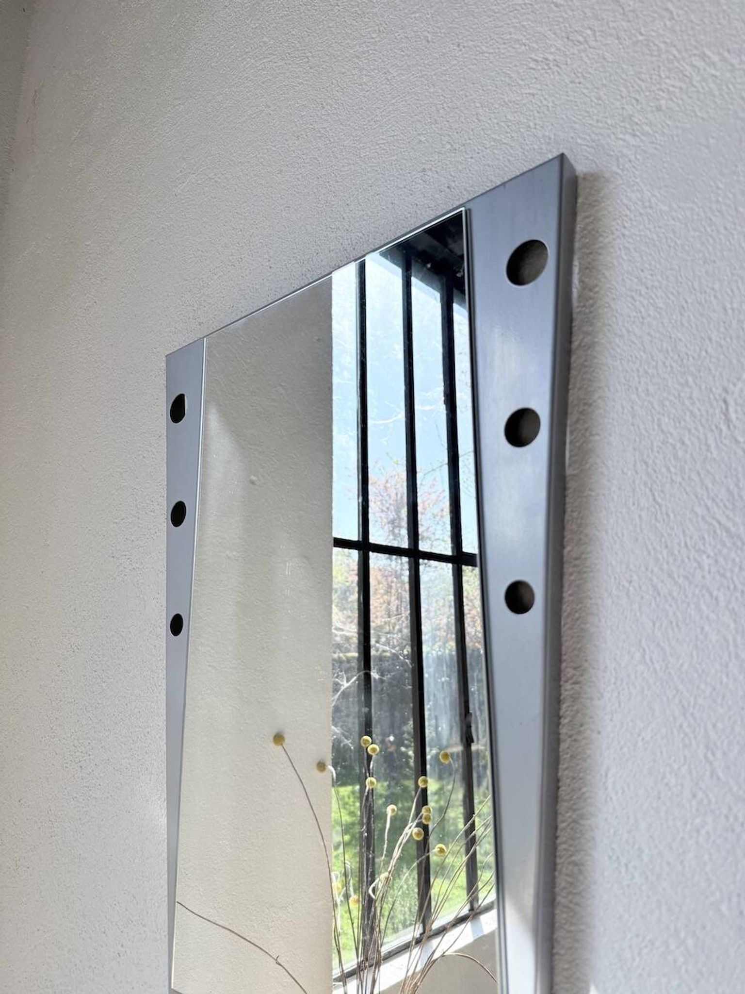 Pair of "Memphis" mirrors from the 80s in chrome and wood.