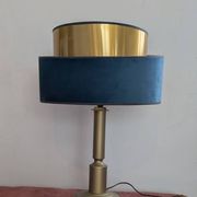 Brass lamp with asymmetrical velvet shade