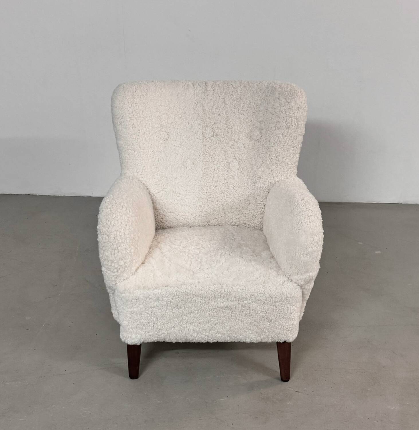 Danish lounge chair with new curly fur upholstery