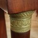 Empire style bedside table in mahogany and bronze
