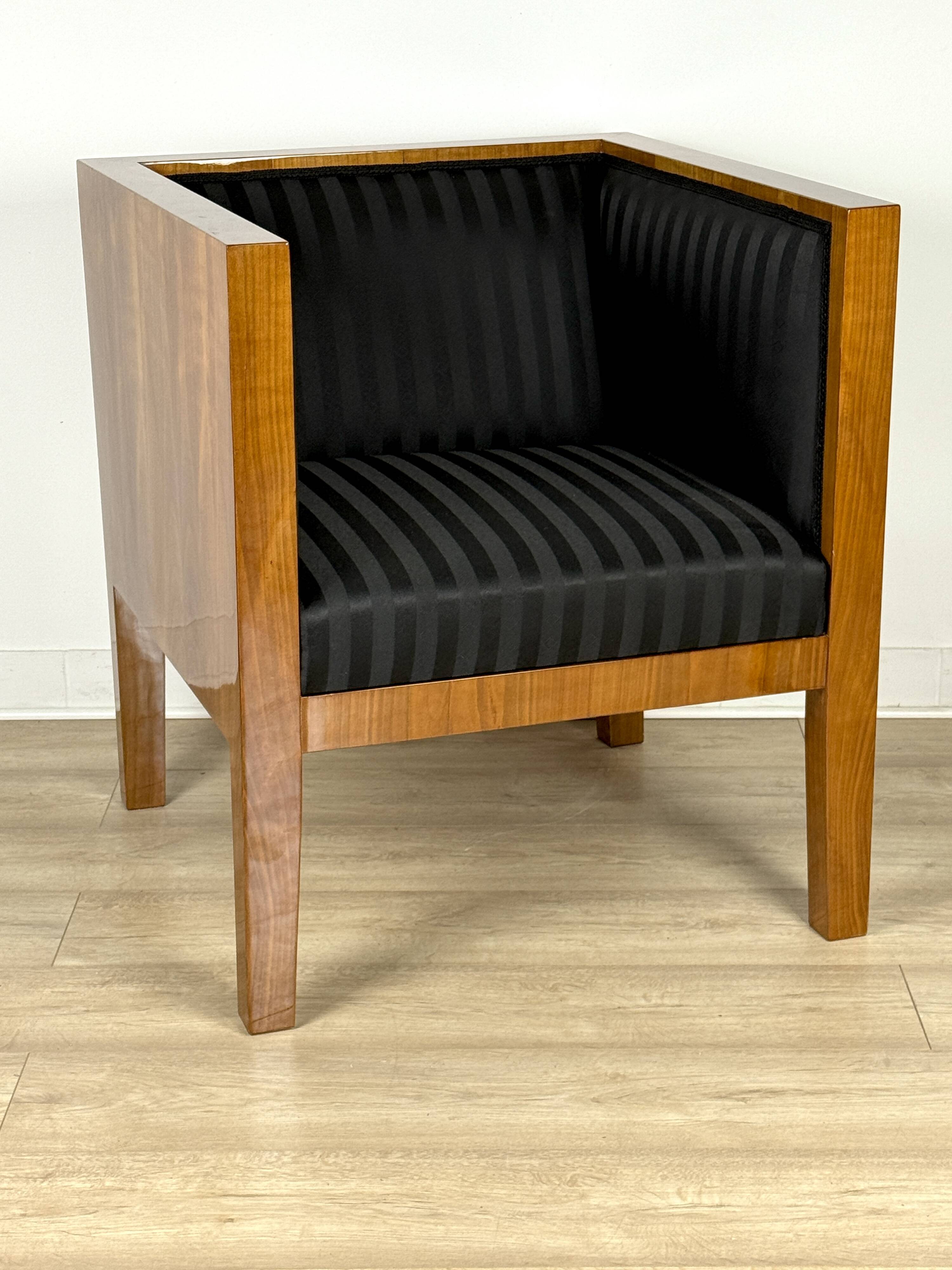 Elegant square-shaped armchair made of natural cherry wood