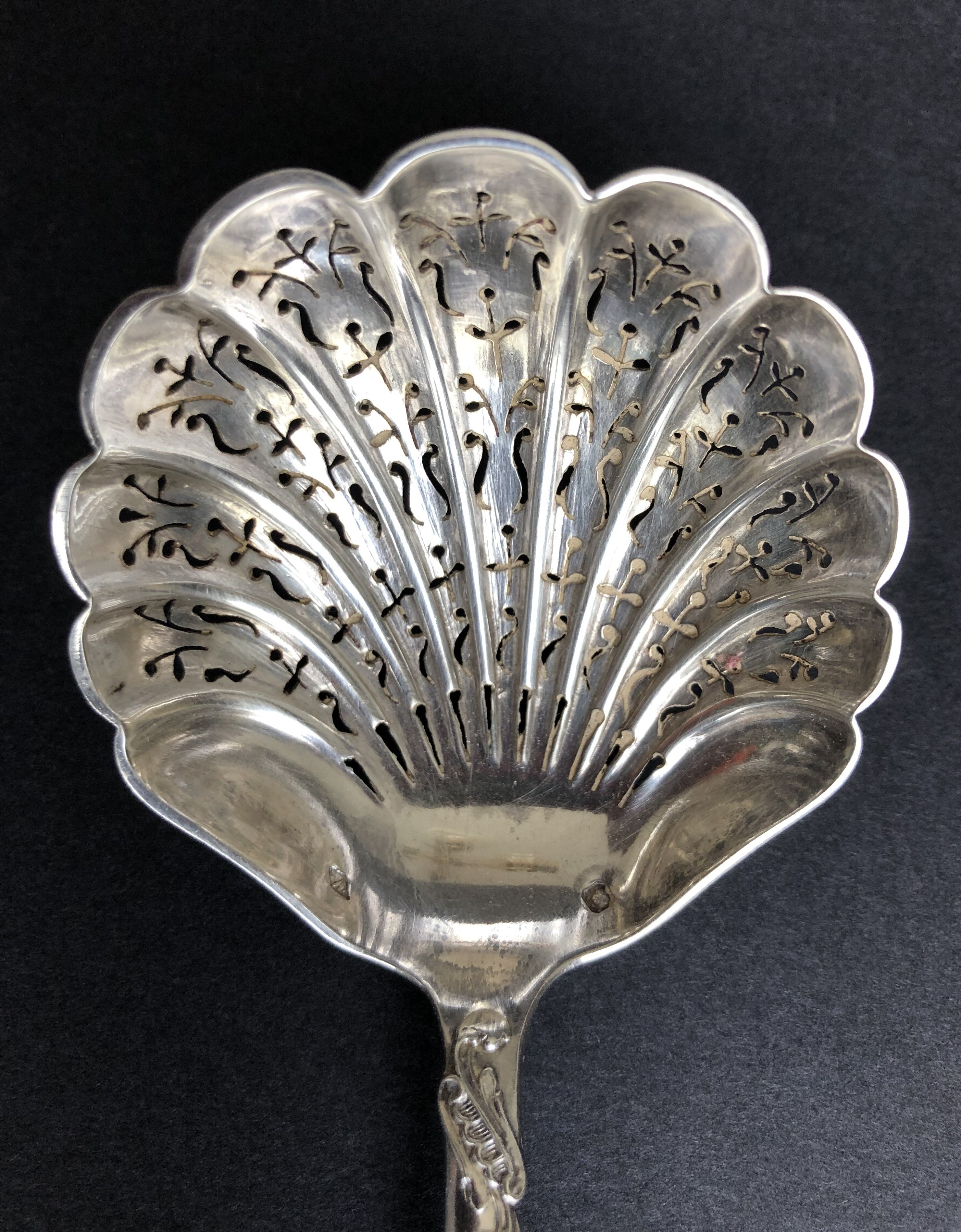 Silver sprinkling spoon