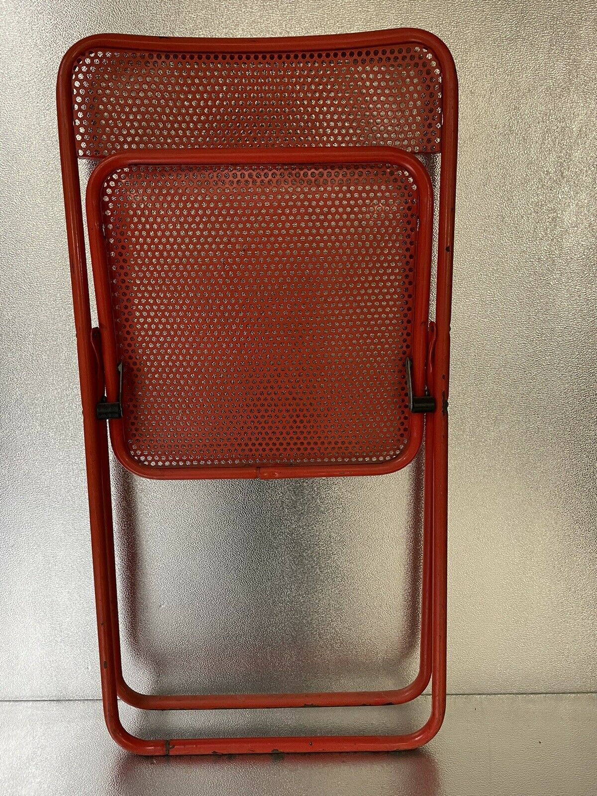 Old folding chair metal perforated red 60s, 70s, vintage