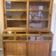 Large antique haberdashery cabinet with glass doors.