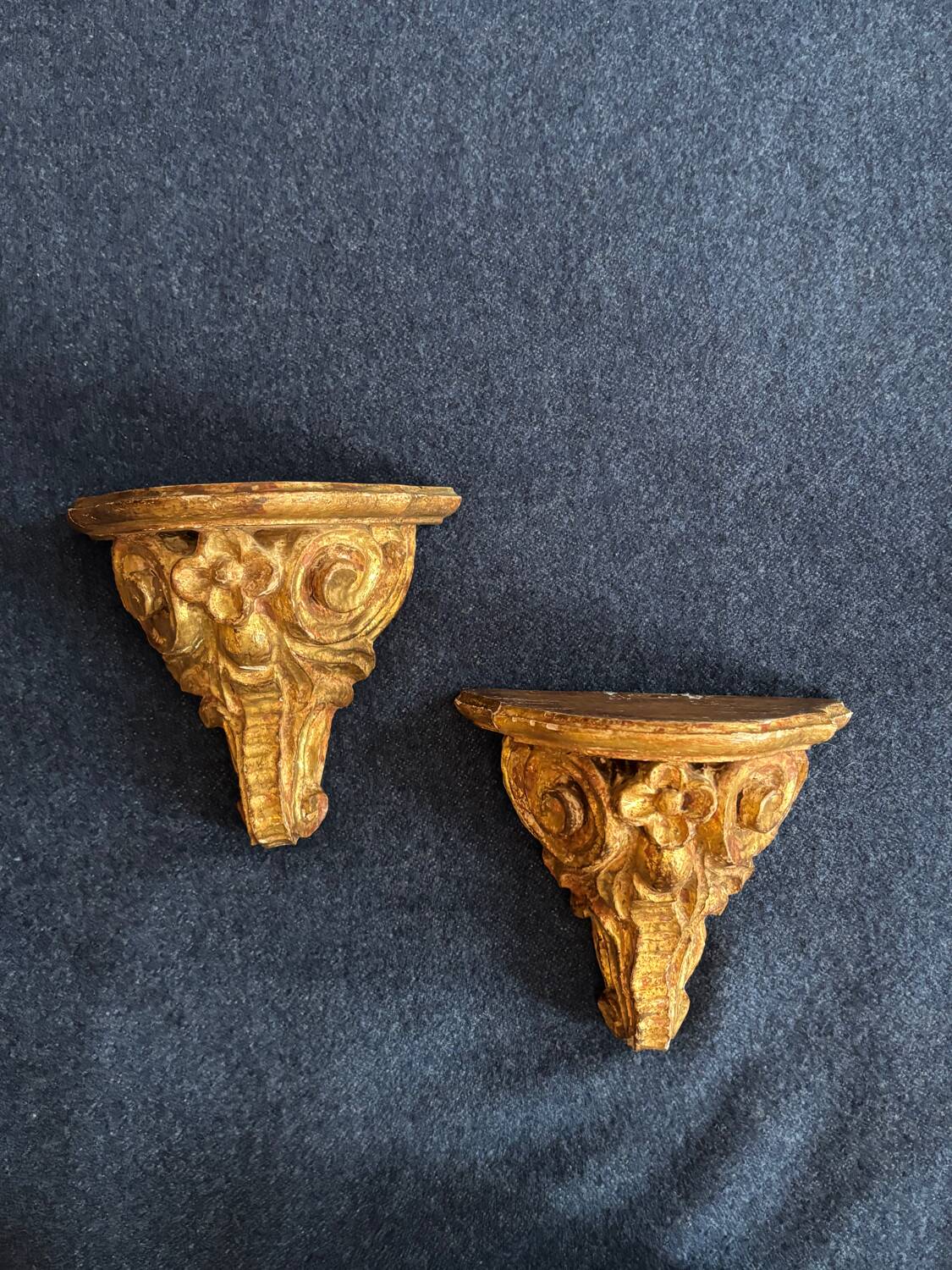 Pair of gilded wooden console tables