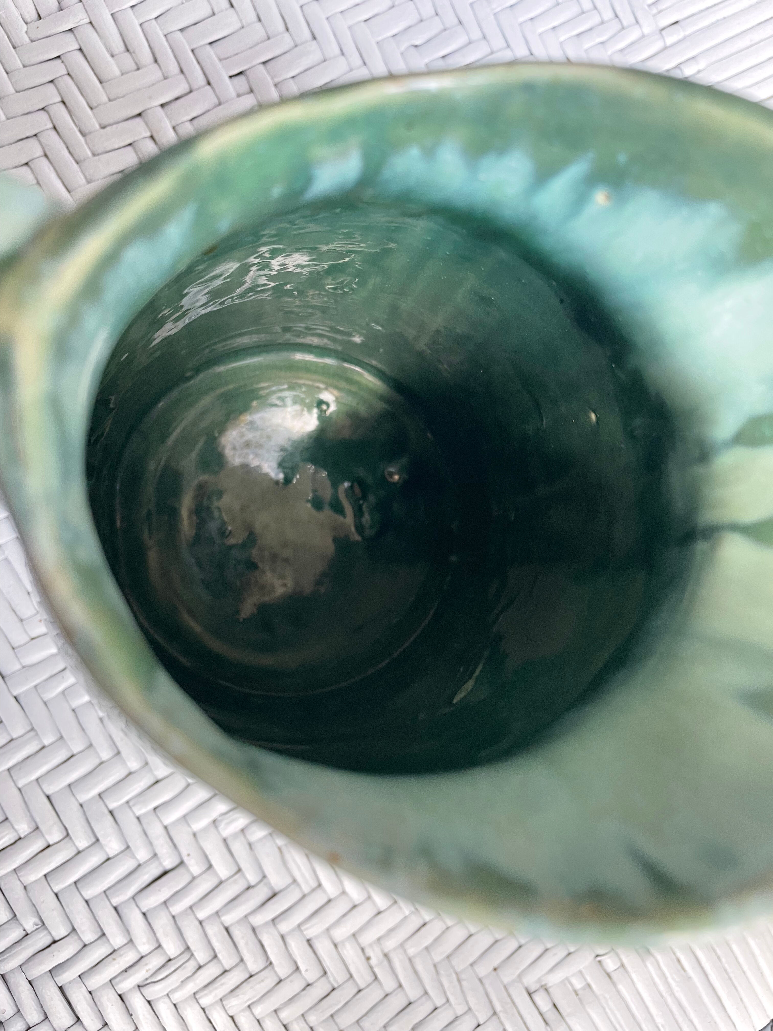 Turquoise green enamelled ceramic pitcher