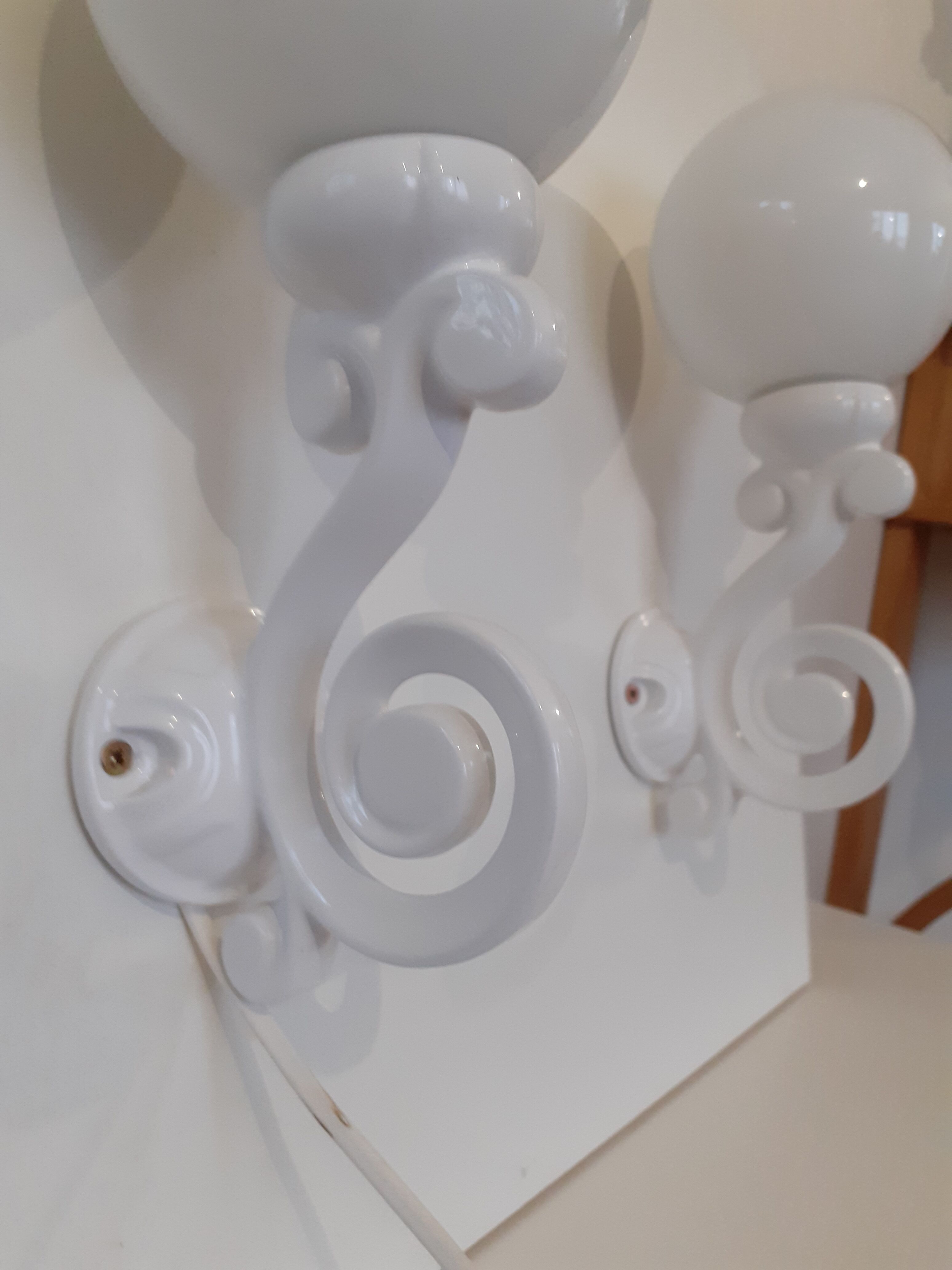 Pair of cast iron sconces