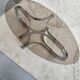 Chrome metal coffee table and oval smoked glass tray