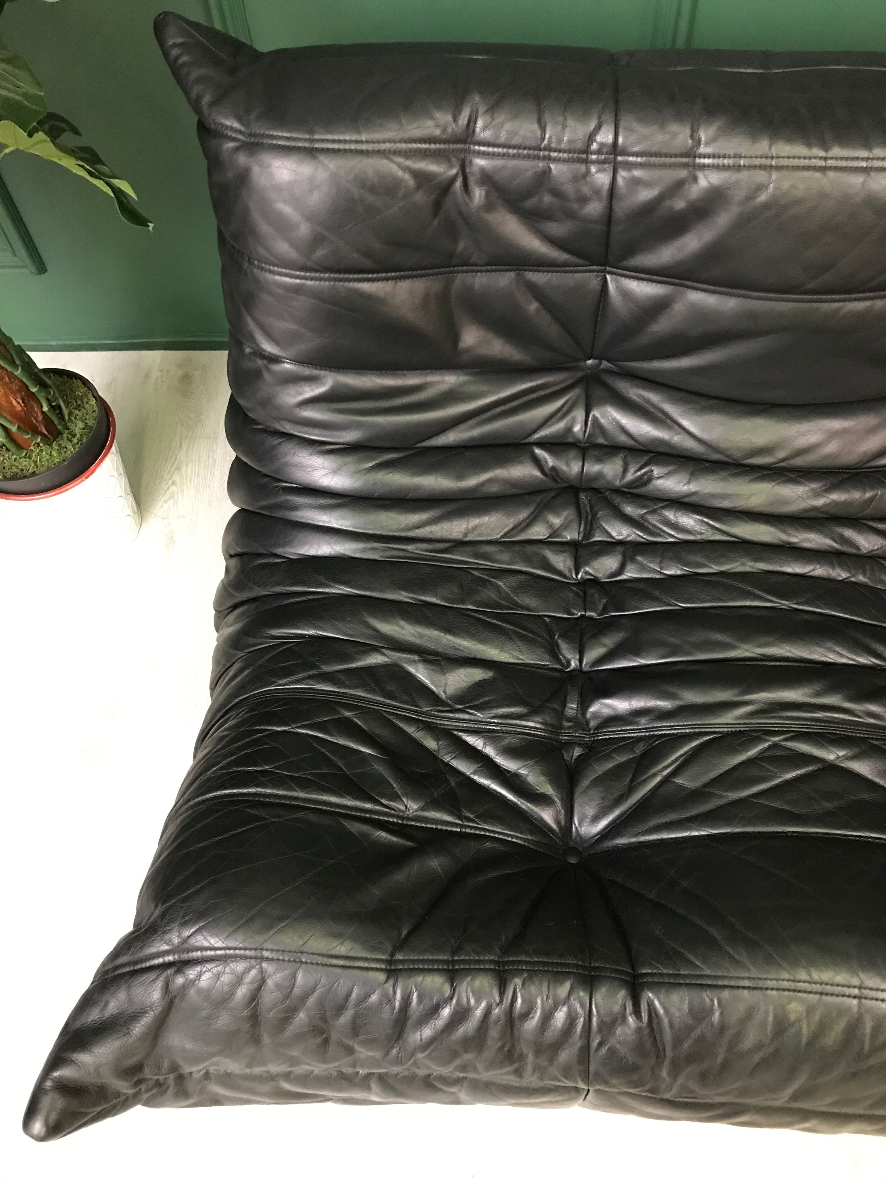 Black leather three seater sofa Togo by Ligne Roset