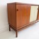 Buffet Ilmari Tapiovaara in teak with fabric and brass details.