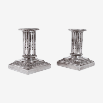 Pair of silver metal candlesticks