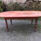 Antique cherry wood farmhouse table with rounded ends