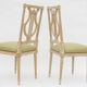 Série de 4 chaises à dossier lyre
