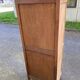 Renovated Louis XV bonnetière dormitory wardrobe in solid oak.