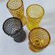 4 vintage stemmed glasses in hobnail glass and smoke colour.