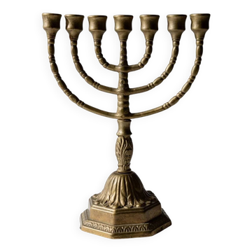 Vintage brass candlestick from the 1950s, seven-branched menorah with ornamental decoration.