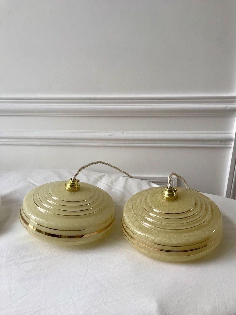 Pair of suspensions in yellow Clichy glass and golden border 40s-50s