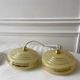 Pair of suspensions in yellow Clichy glass and golden border 40s-50s