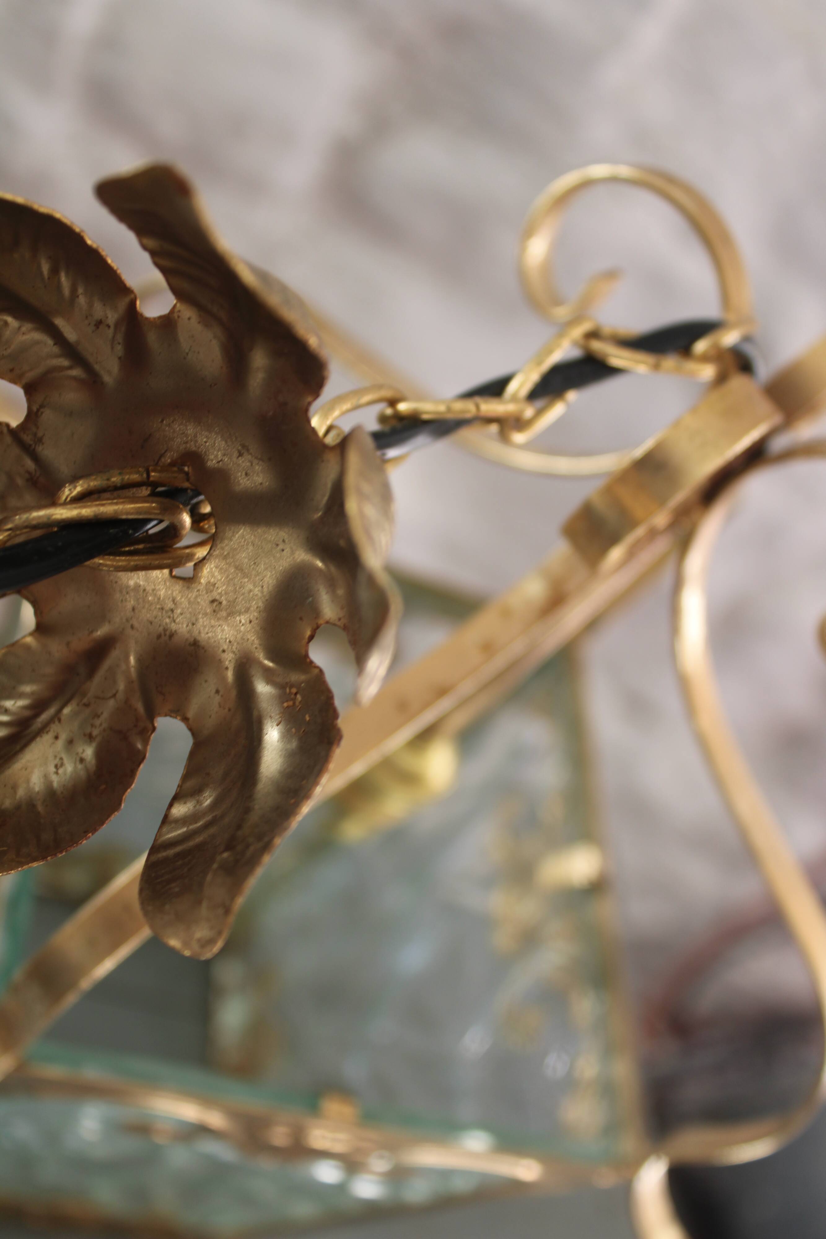 Glass and brass suspension