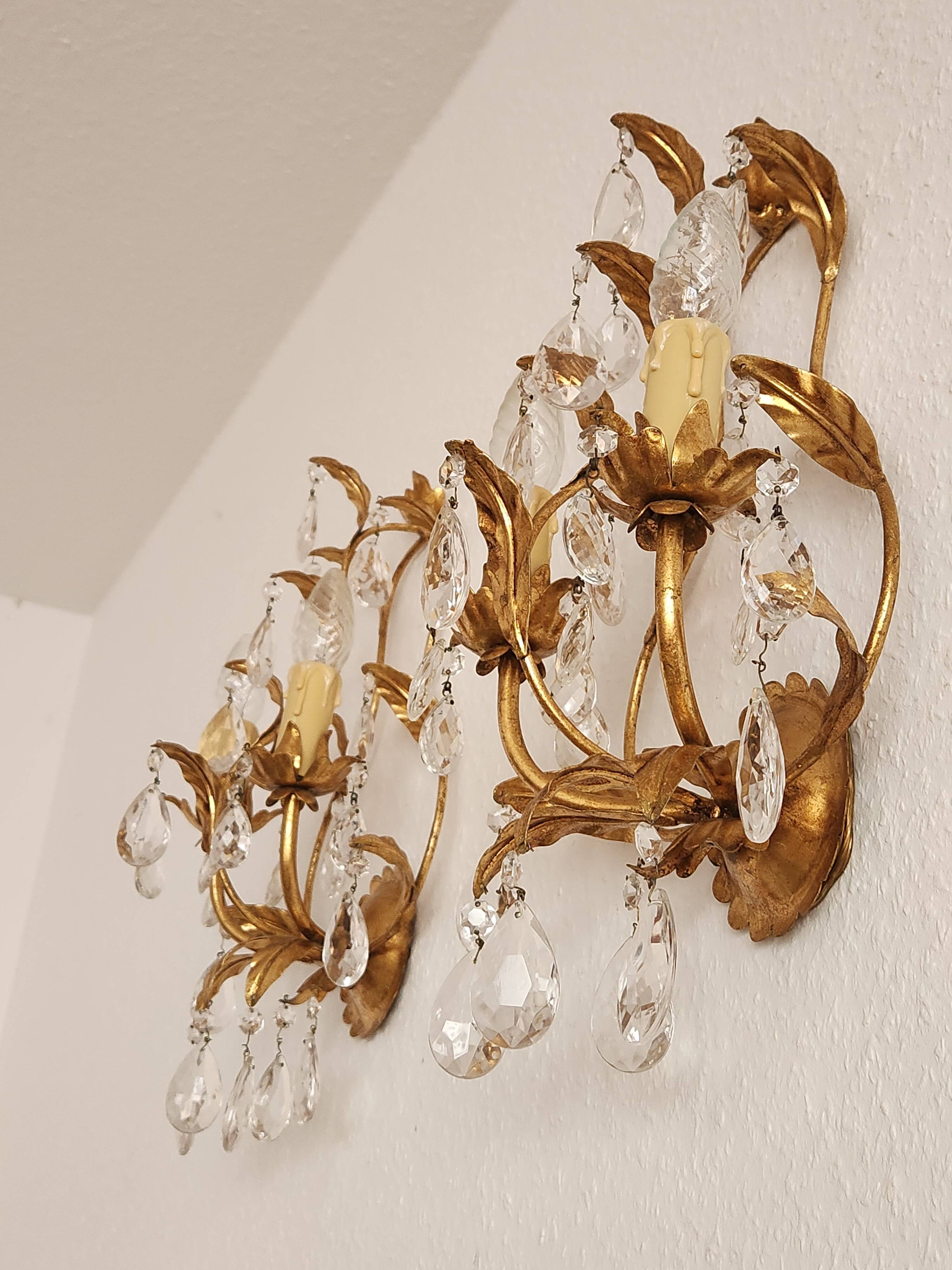 Hand-forged wall lamp gilded with gold leaf and crystals, Italy