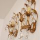 Hand-forged wall lamp gilded with gold leaf and crystals, Italy