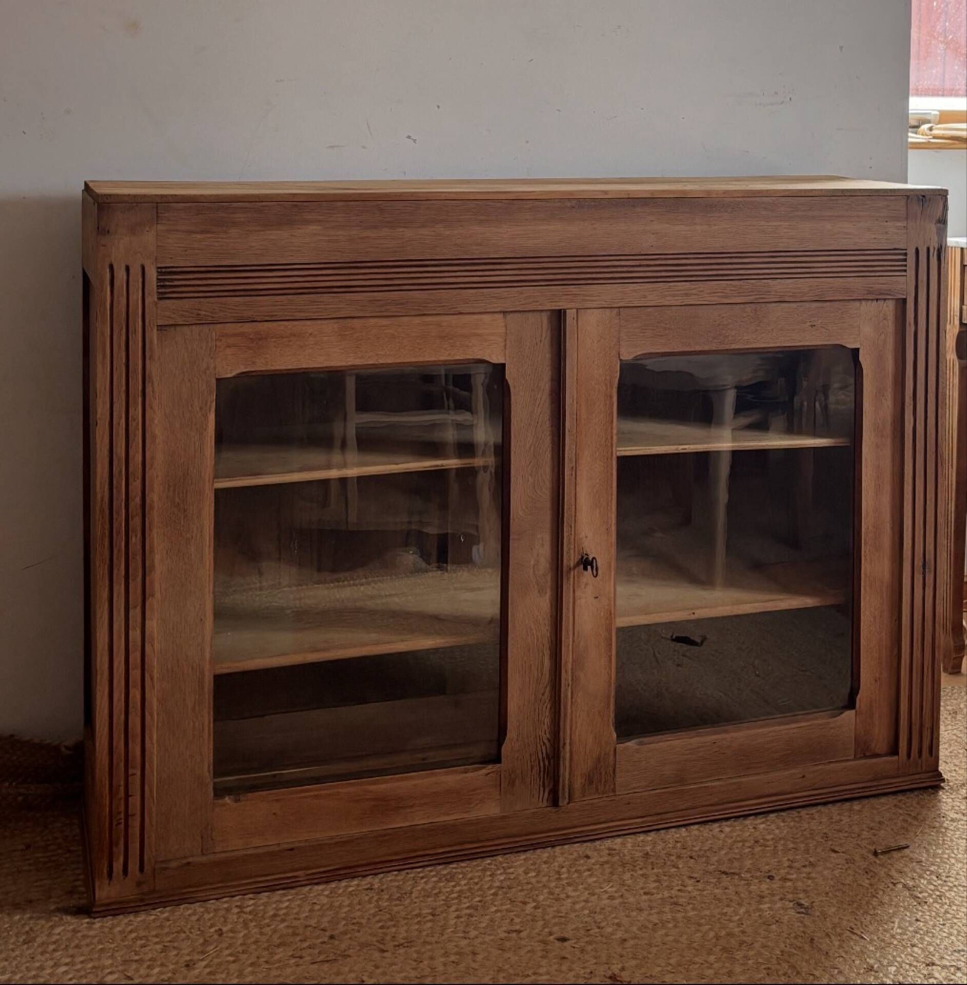 Narrow antique solid wood buffet - glass doors