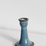 Antique candle holder in glazed ceramic