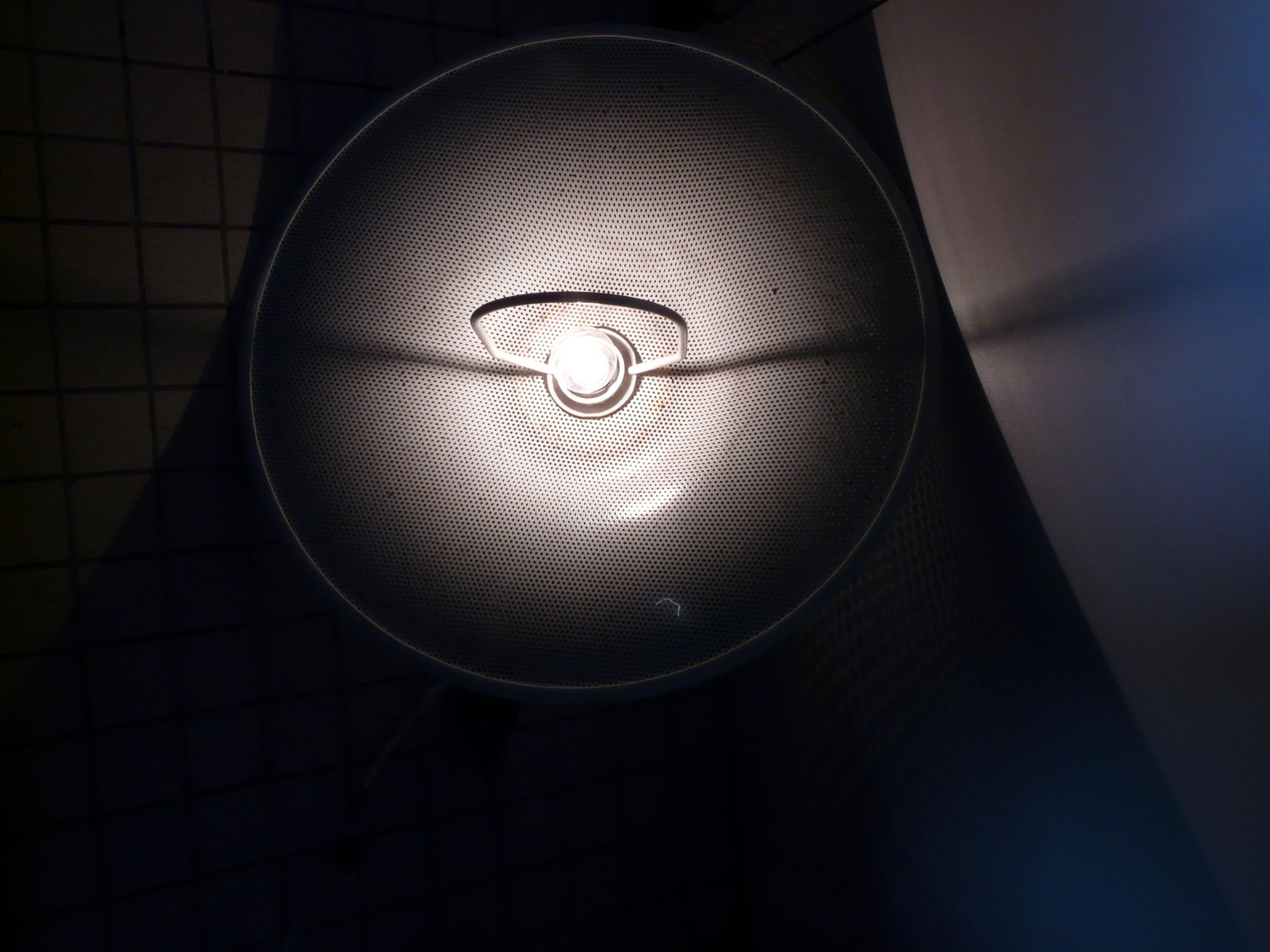 White perforated sheet metal chandelier