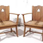 Pair of brutalist oak throne chairs with rush seats – Netherlands, 1930s
