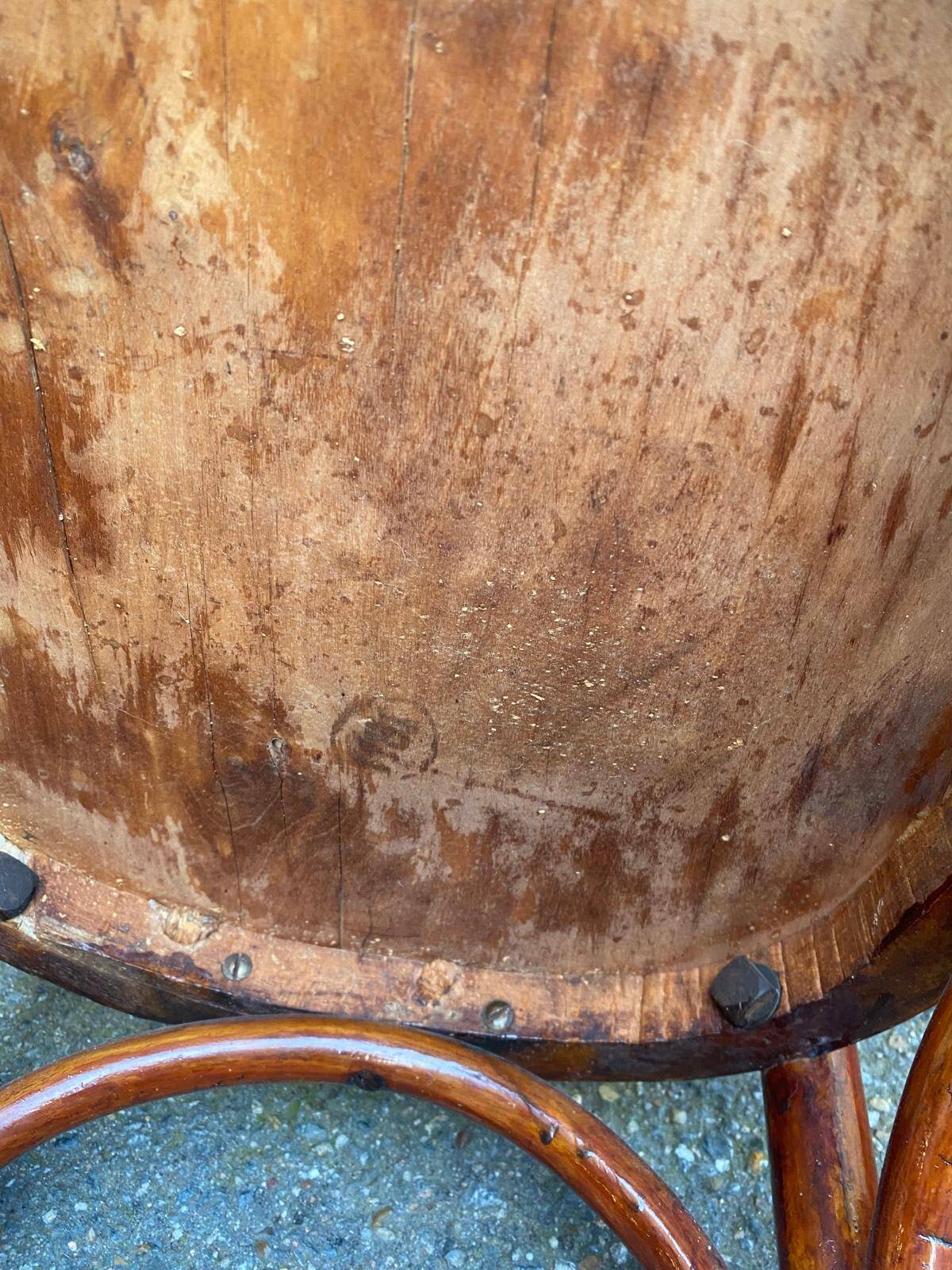 2 curved solid wood bistro chairs in Bordeaux.