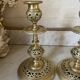 pair of openwork gilded brass candlesticks from the 19th century