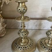 pair of openwork gilded brass candlesticks from the 19th century