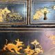 black English commode with gold decoration, Asian inspiration