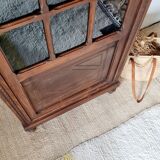 Old glass-fronted library in solid wood