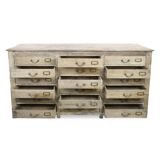 Old wooden sideboard with 18 drawers