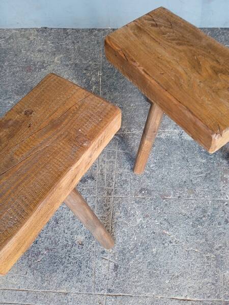 Pair of low stools in old patinated solid wood
