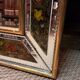 Beveled mirror decorated with flowers