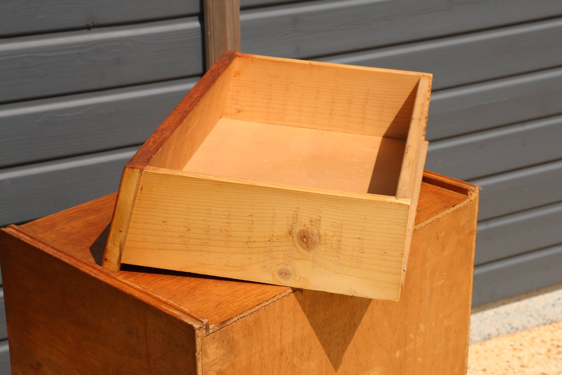 Dark chest of drawers with 5 drawers from the 1950s